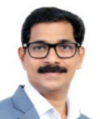 President – Haneesh K Vaniyankandi Portrait of Haneesh K Vaniyankandi, President of The North Malabar Chamber of Commerce for 2026–27.